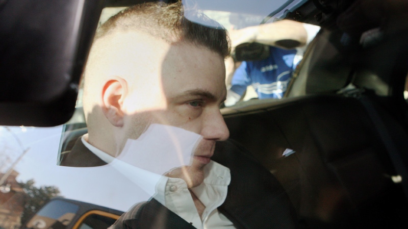 Michael Rafferty is transported from the courthouse in the back of police cruiser in London, Ontario, Wednesday, March, 14, 2012.  (Dave Chidley / THE CANADIAN PRESS)