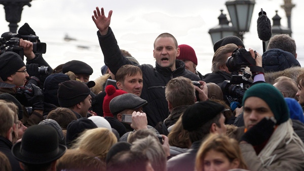 Opposition leader Sergei Udaltsov, center back, speaks at an unsanctioned rally at Pushkin Square in Moscow, Russia, Saturday, March 17, 2012. (AP / Ivan Sekretarev)