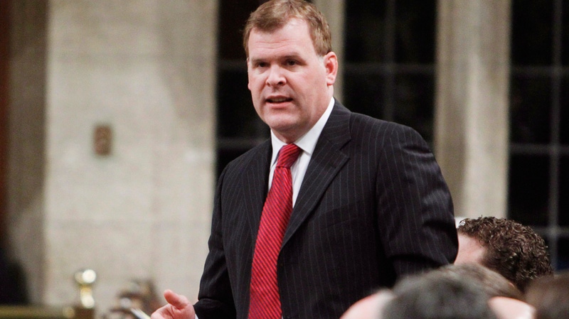 Foreign Affairs Minister John Baird stands in the House of Commons during Question Period, Friday March 16, 2012 in Ottawa. 