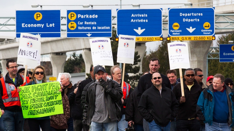 Aveos and Air Canada machinists and aerospace workers hold a protest outside of Vancouver International airport in Richmond, B.C. Monday, March, 19, 2012. (Jonathan Hayward / THE CANADIAN PRESS)