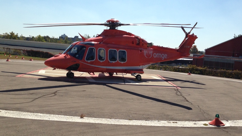 An Ornge air ambulance sits on a helipad in Kitchener, Ont., on Friday, Oct. 17, 2014. (David Imrie / CTV Kitchener)