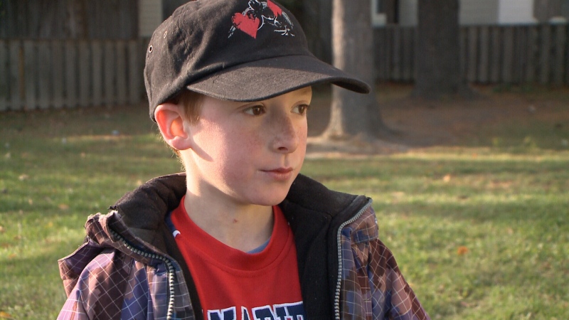 Police are investigating after 10-year-old Ethan Bailey says he found a needle in a Halloween treat he bit into Oct. 8, 2014.