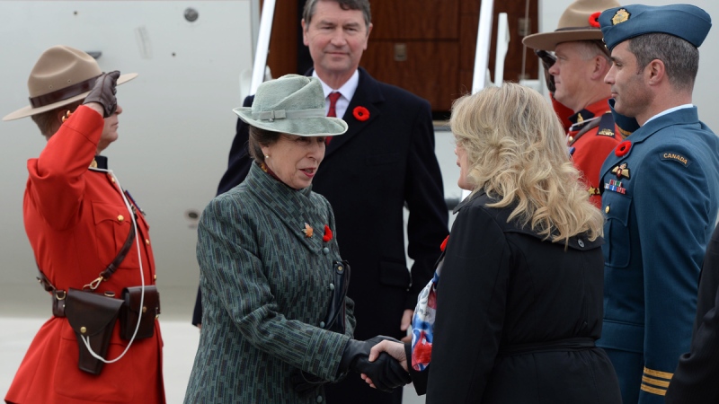 Princess Anne is greeted by Minister of Heritage Shelly Glover as she arrives with Vice Admiral Sir Tim Laurence to Ottawa on Monday, Nov. 10, 2014. (Sean Kilpatrick / THE CANADIAN PRESS)