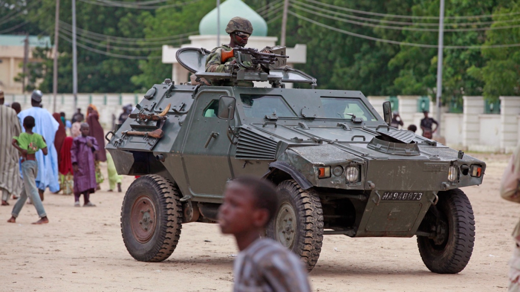Nigerian soldiers patrol in Maiduguri
