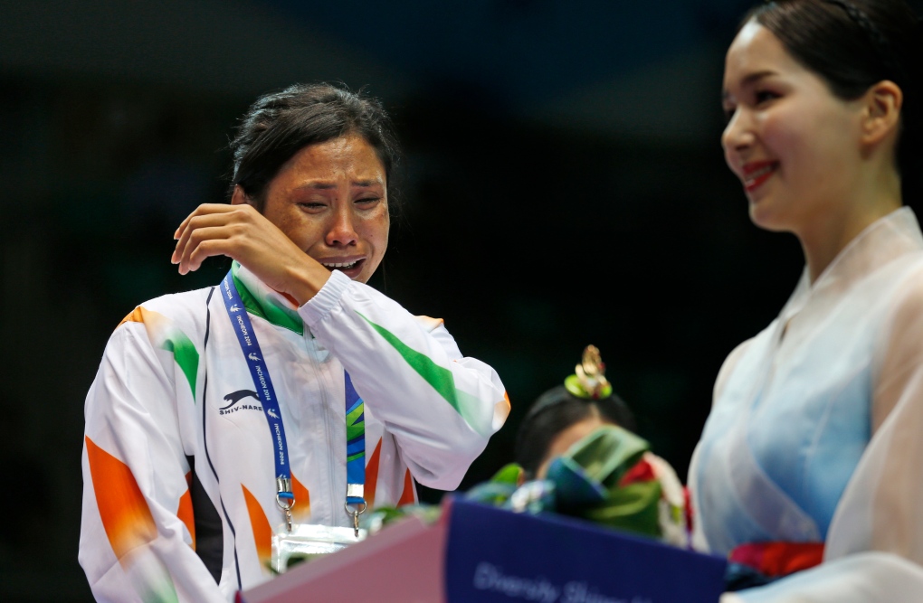 Sarita Devi cries after refusing Asian Games medal