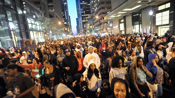 Thousands of people march as part of the "Million Hoodie March" to support the family of Trayvon Martin, the black Florida teen shot to death by a neighborhood watch captain, on Friday, March 23, 2012 in Philadelphia. (AP / The Inquirer, Ron Tarver)