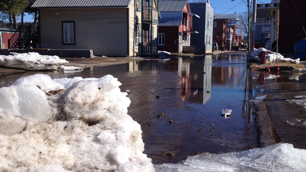 St. Ignace St., near the Sainte Anne river in Saint Raymond, shows signs of spring flooding (March 23, 2012, CTV Montreal, Frederic Bissonnette)