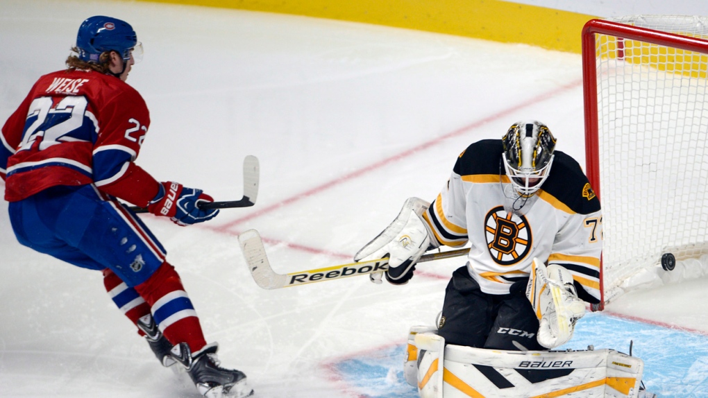 Dale Weise scores against Boston Bruins