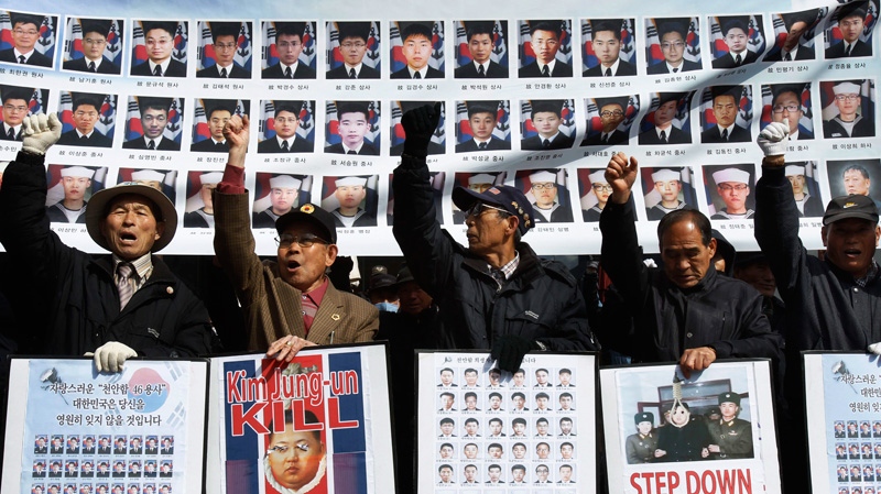 Protesters denounce North Korean leader Kim Jong Un as they remember dead South Korean Navy sailors days before the Nuclear Security Summit in Seoul, South Korea, Saturday, March 24, 2012.