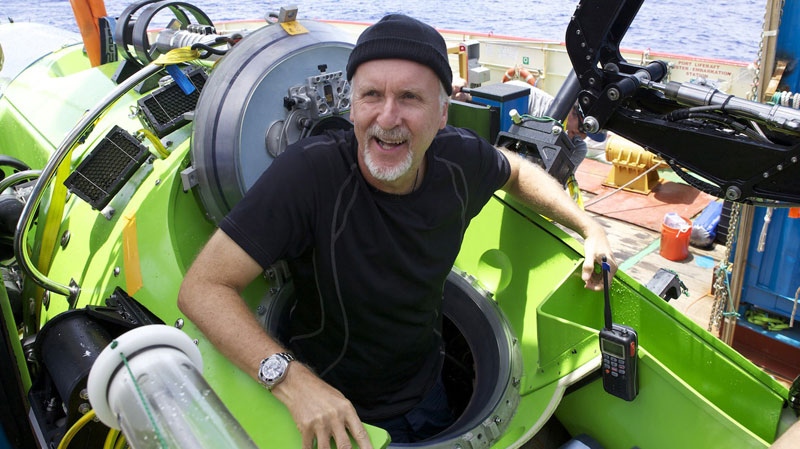 Filmmaker and National Geographic Explorer-in-Residence James Cameron emerges from the Deepsea Challenger submersible after his successful solo dive to the Mariana Trench, the deepest part of the ocean, Monday March 26, 2011.  (Mark Theissen, National Geographic)