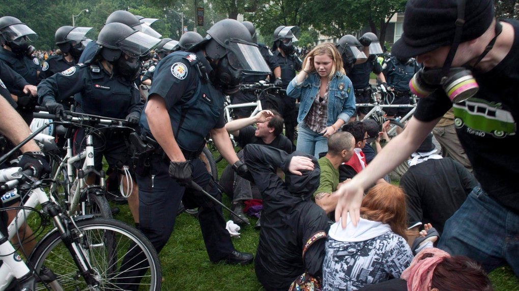 Police clear protesters at Queen's Park in 2010