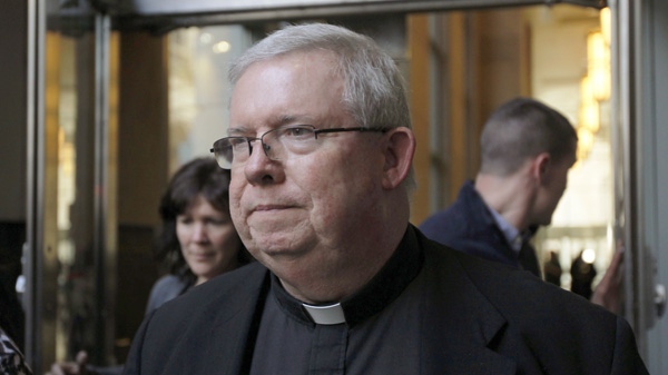 Monsignor William Lynn exits the Criminal Justice Center, Monday, March 26, 2012, in Philadelphia. (AP / Matt Rourke)