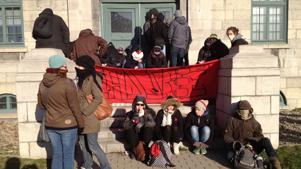 Dozens of students opposed to tuition hikes blocked the doors to the SAQ headquarters on Tuesday morning (March 27, 2012, CTV Montreal/Jean-Luc Boulch)