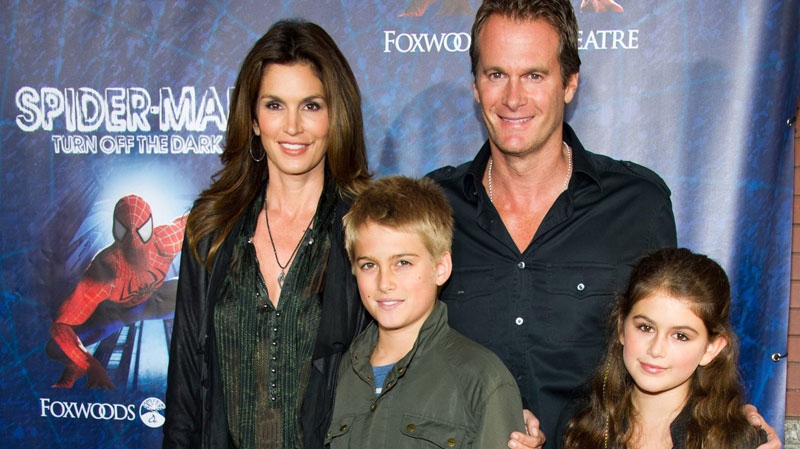Cindy Crawford and Rande Gerber arrive with their children Presley and Kaia to the opening night performance of the Broadway musical 'Spider-Man: Turn Off the Dark' in New York, Tuesday, June 14, 2011. (AP / Charles Sykes)