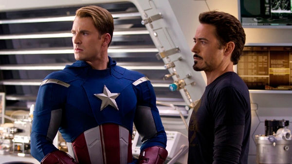 In this film image released by Disney, Chris Evans, portraying Captain America, left, and Robert Downey Jr., portraying Tony Stark, are shown in a scene from "Marvel's The Avengers." (Disney / Zade Rosethal)