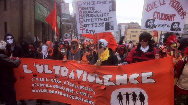 Anti-violence, anti-tuition hike protesters march along Sherbrooke St. (March 29, 2012, CTV Montreal/Marc Latendresse)