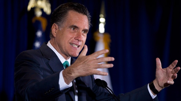 In this March 26, 2012, photo, Republican presidential candidate, former Massachusetts Gov. Mitt Romney gestures while speaking at NuVasive, Inc., a medical device company, in San Diego, Calif.  (AP / Steven Senne)