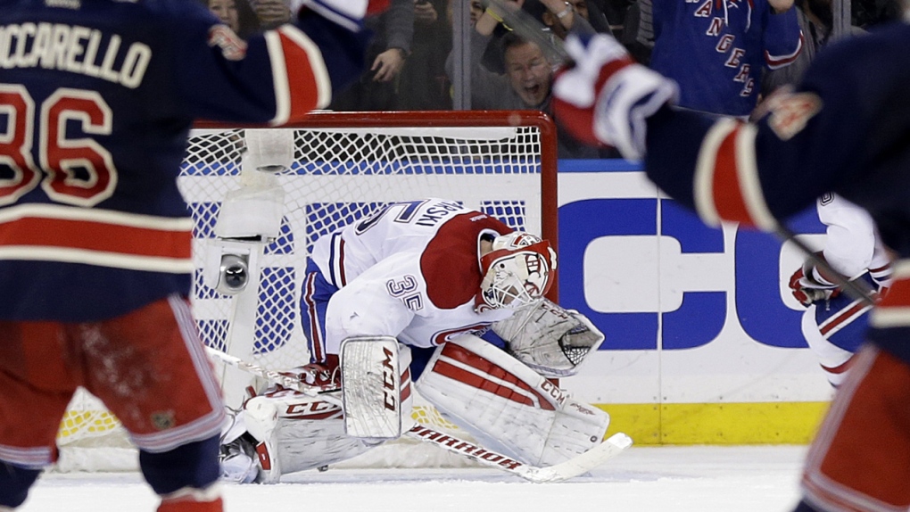 Dustin Tokarski reacts after being scored on