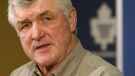 Then-Toronto Maple Leafs head coach Pat Quinn answers questions in Toronto on April 19, 2004. (Frank Gunn / THE CANADIAN PRESS)
