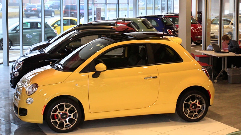 In a Feb. 29, 2012 photo, Fiat 500 vehicles are displayed at the Golling Fiat dealership in Birmingham, Mich. Chrysler Group was the first automaker to report sales Tuesday, April 3, 2012. Its U.S. sales jumped 34 percent in March on strong sales of Fiat small cars and Chrysler sedans. (AP Photo/Carlos Osorio)