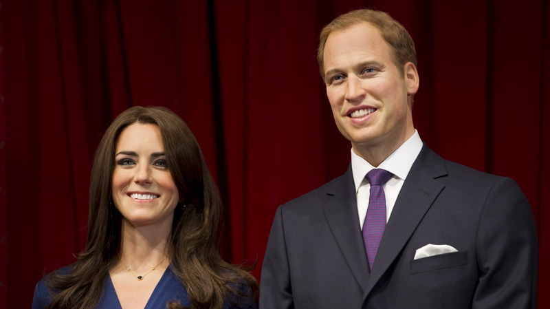 Waxworks of the Duke and Duchess of Cambridge are unveiled at Madame Tussauds, London, Wednesday, April 4, 2012. (AP Photo/Jonathan Short)