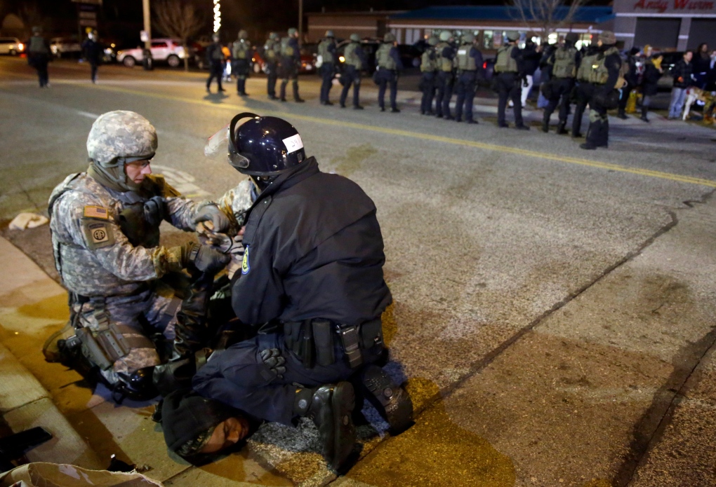 Ferguson protester taken into custody