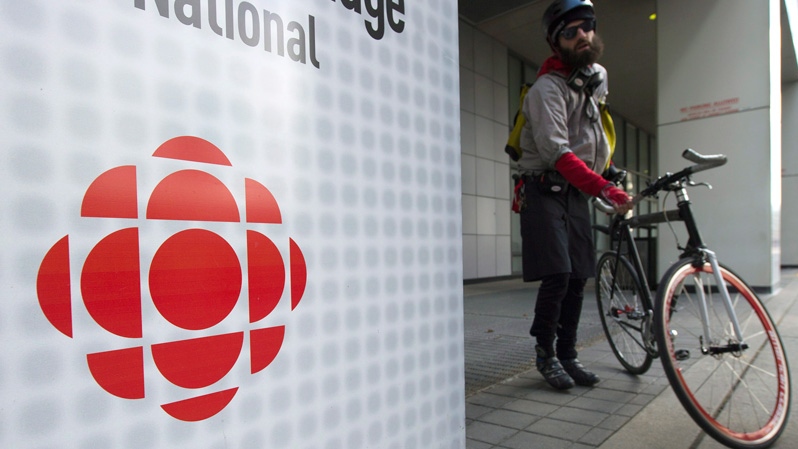 A bike courier parks his bicycle at the CBC buildi