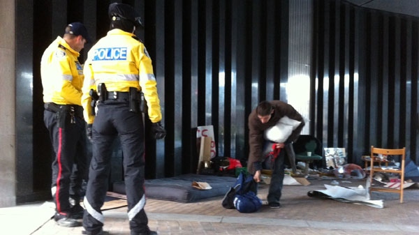 Toronto police move to dismantle an Occupy encampment at 361 University Ave., on Thursday, April 5, 2012.