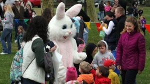 An Easter Bunny greets children during an annual Easter egg hunt in Linwood, N.J., on March 31, 2012. (AP /The Press of Atlantic City, Vernon Ogrodnek)