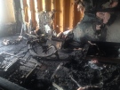 Destroyed furniture can be seen inside 4183 Spago Cres. on Monday, Dec. 1, 2014 after being the target of an arson in Windsor, Ont. (Sacha Long/ CTV Windsor)