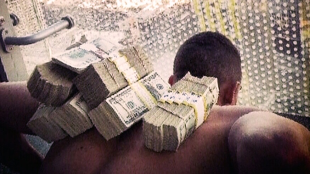 Image result for evander kane holding stack of money