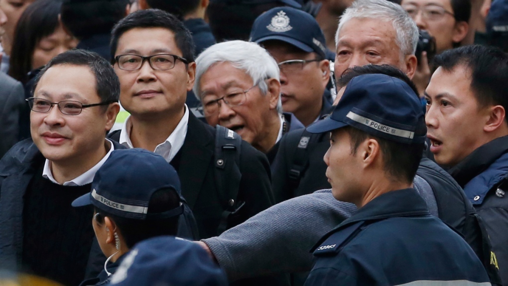 Four Hong Kong protest leaders before surrendering