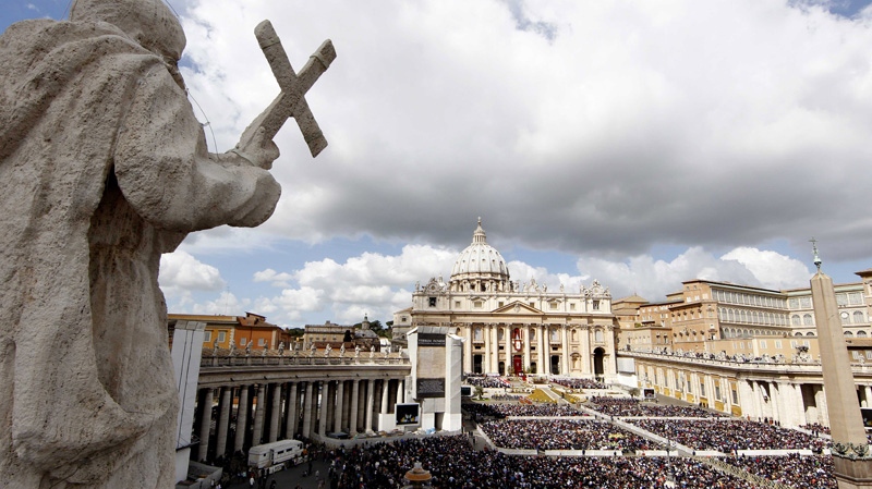 Faithful gather in St. Peter's Square at the Vatican during the Easter Mass celebrated by Pope Benedict XVI, Sunday, April 8, 2012. (AP Photo/Pier Paolo Cito)