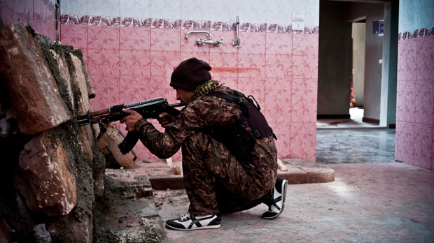 Kurdish fighter in Kobani, Syria