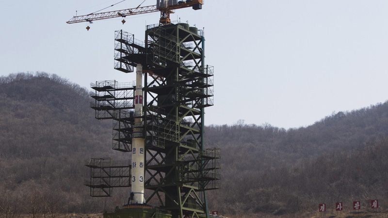 North Korea's Unha-3 rocket, slated for liftoff between April 12-16, stands at Sohae Satellite Station in Tongchang-ri, North Korea on Sunday April 8, 2012. (AP Photo/David Guttenfelder)