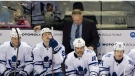 Toronto Maple Leafs head coach Randy Carlyle looks down behind the bench during first period NHL hockey action against the Montreal Canadiens in Montreal, Saturday, April 7, 2012. THE CANADIAN PRESS/Graham Hughes