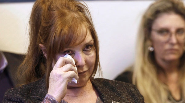 Debra Tate, the sister of Manson Family murder victim, actress Sharon Tate, wipes her eyes during a parole hearing for former Manson follower, Charles 'Tex" Watson, Wednesday Nov. 16, 2011.(AP / Rich Pedroncelli)