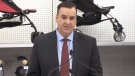 Federal Industry Minister James Moore speaks to the media in Toronto, Ont., Tuesday, Dec. 9, 2014.