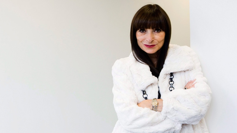 Host of Fashion Television and fashion icon Jeanne Beker poses for a photograph wearing her own brand outfit called Edit by Jeanne Beker in Toronto on Wednesday, Aug. 25, 2010. (Nathan Denette / THE CANADIAN PRESS)