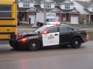 A school bus and OPP cruiser collided on Scotland Street in Fergus on Tuesday, Dec. 9, 2014.