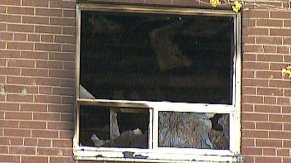 Damage is seen following a fire at an apartment complex on Inverness Drive in Guelph, Ont. on Thursday, April 12, 2012.