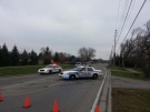 London police block off the area of Hamilton Road and Crimson Cresent in London, Ont., Wednesday, Dec.10, 2014. (Justin Zadorsky / CTV London)