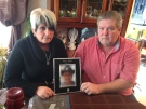 Don and Marlene Affleck show a picture of their son Wayne Affleck on Wednesday, Dec. 10, 2014. (Christie Bezaire / CTV Windsor)