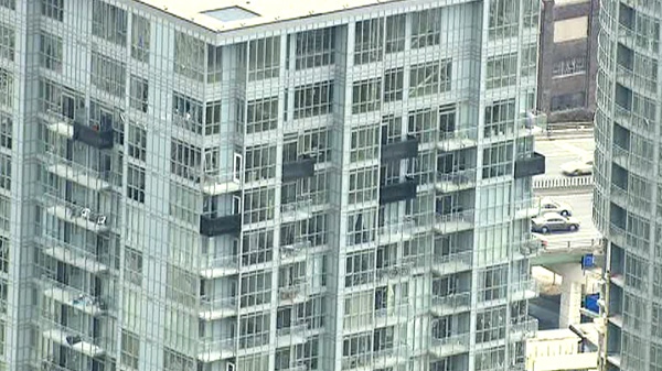 A Toronto condo corporation is installing mesh on three of its buildings to prevent glass from falling on city streets. 