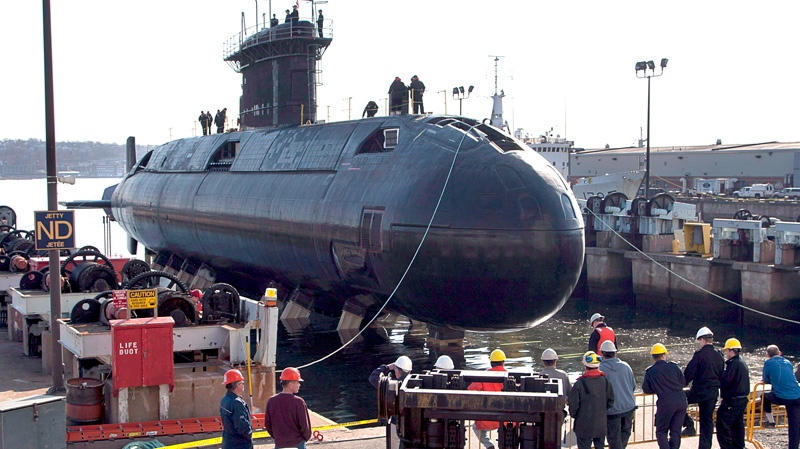 HMCS Windsor, one of Canada's four Victoria-class submarines, is returned to the waters of Halifax harbour after a five-year refit, in Halifax on Wednesday, April 11, 2012. (Andrew Vaughan / THE CANADIAN PRESS)