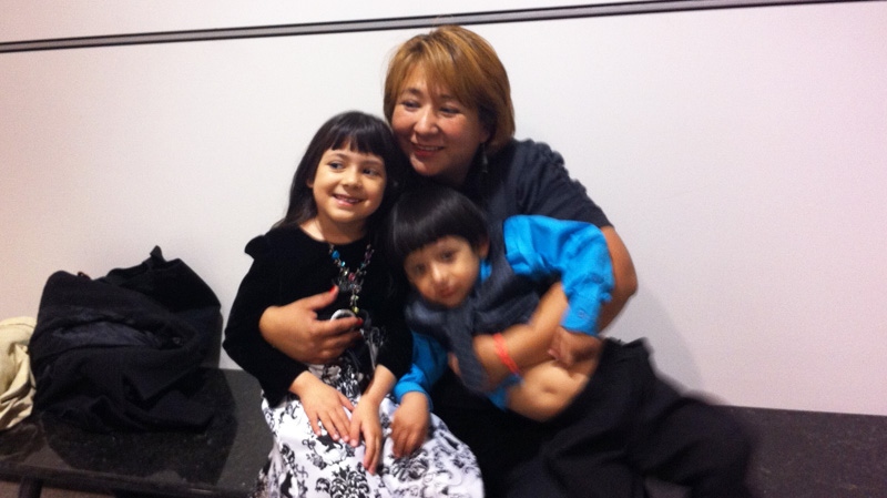 Paola Ortiz was reunited with her two children Friday in Montreal after seven months apart. (Photo Marc Doucette)