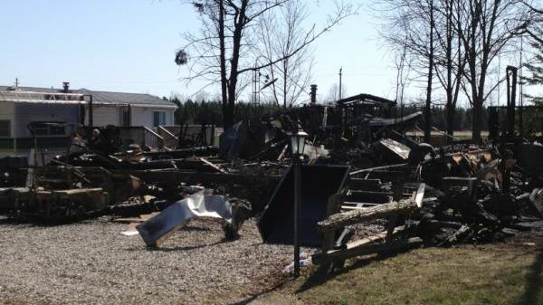 Trailers destroyed by a fire overnight are seen at Maple Leaf Acres park on Belwood Lake in Fergus, Ont. on Friday, April 13, 2012. (Lee Boyadjian / CTV News)