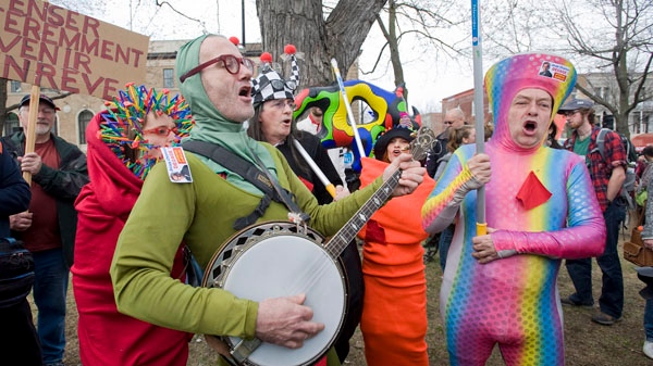 Colourful protesters opposing the rise in tuition fees demonstrate in Montreal Saturday, April 14, 2012. (Graham Hughes / THE CANADIAN PRESS)