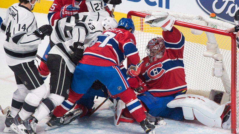 Montreal Canadiens goaltender Carey Price is pushe