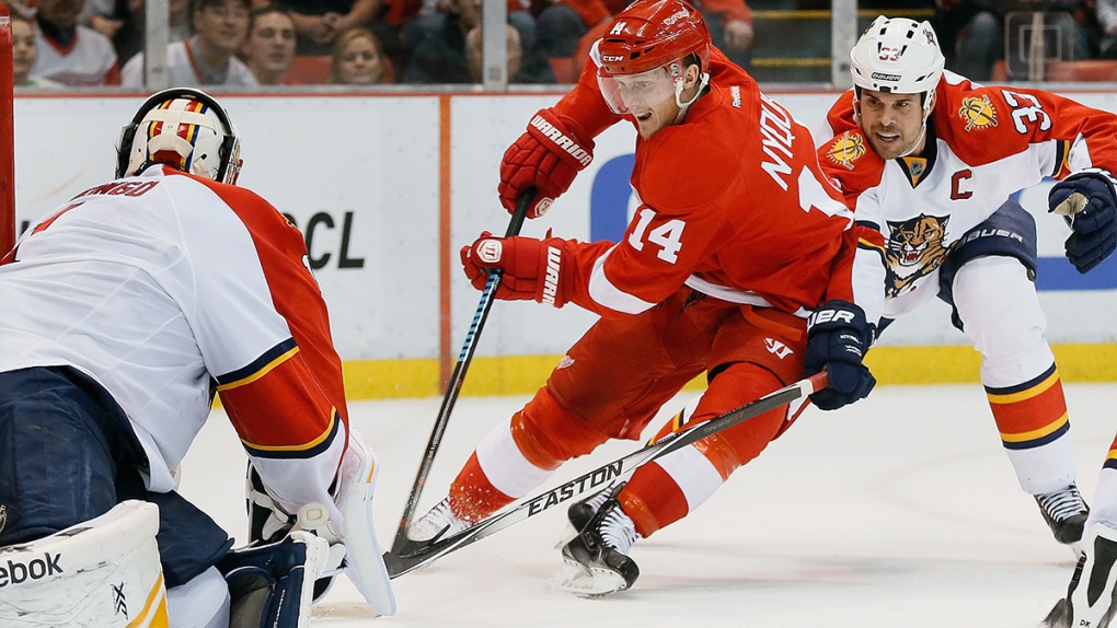 Red Wings centre Gustav Nyquist attacks